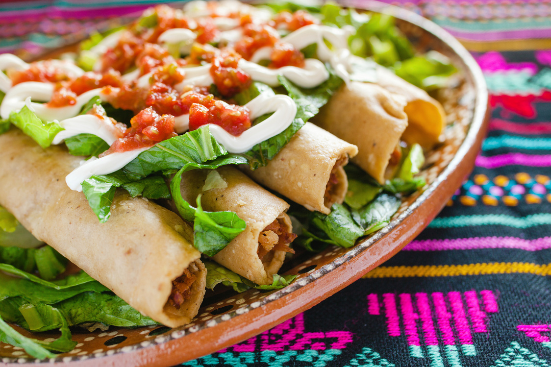 flautas de pollo, chicken tacos dorados and Salsa Homemade Mexican food in mexico city