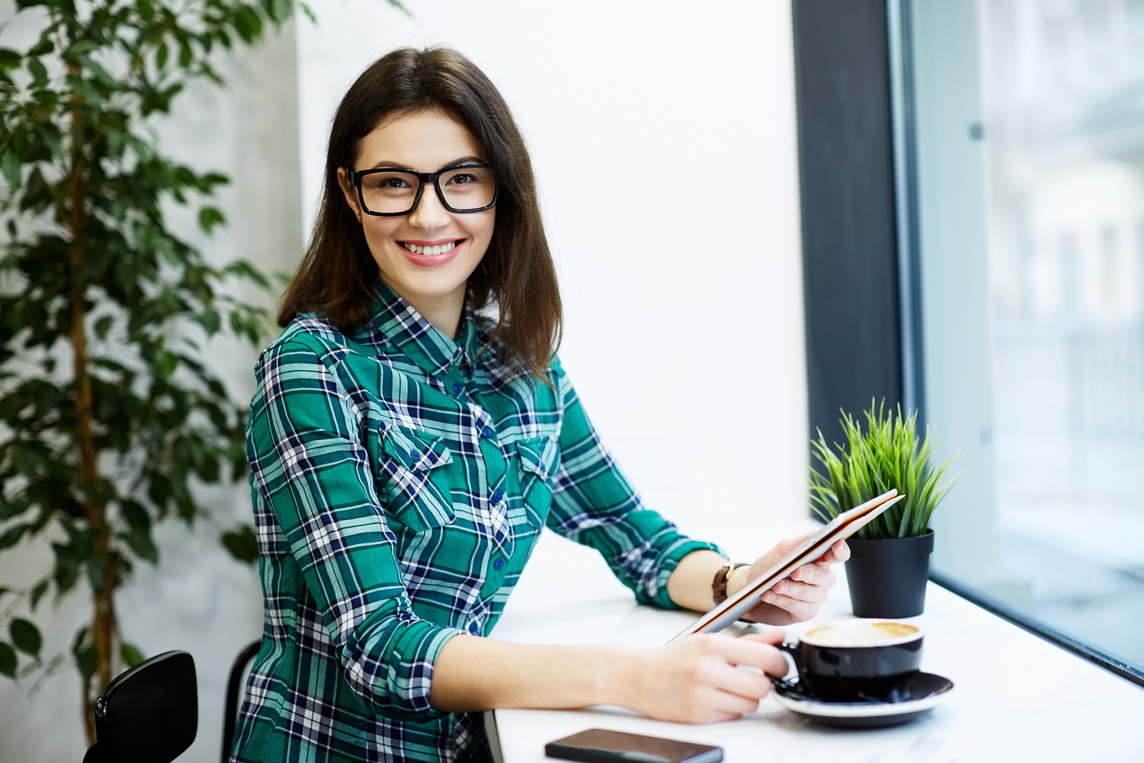 Girl working in cafe