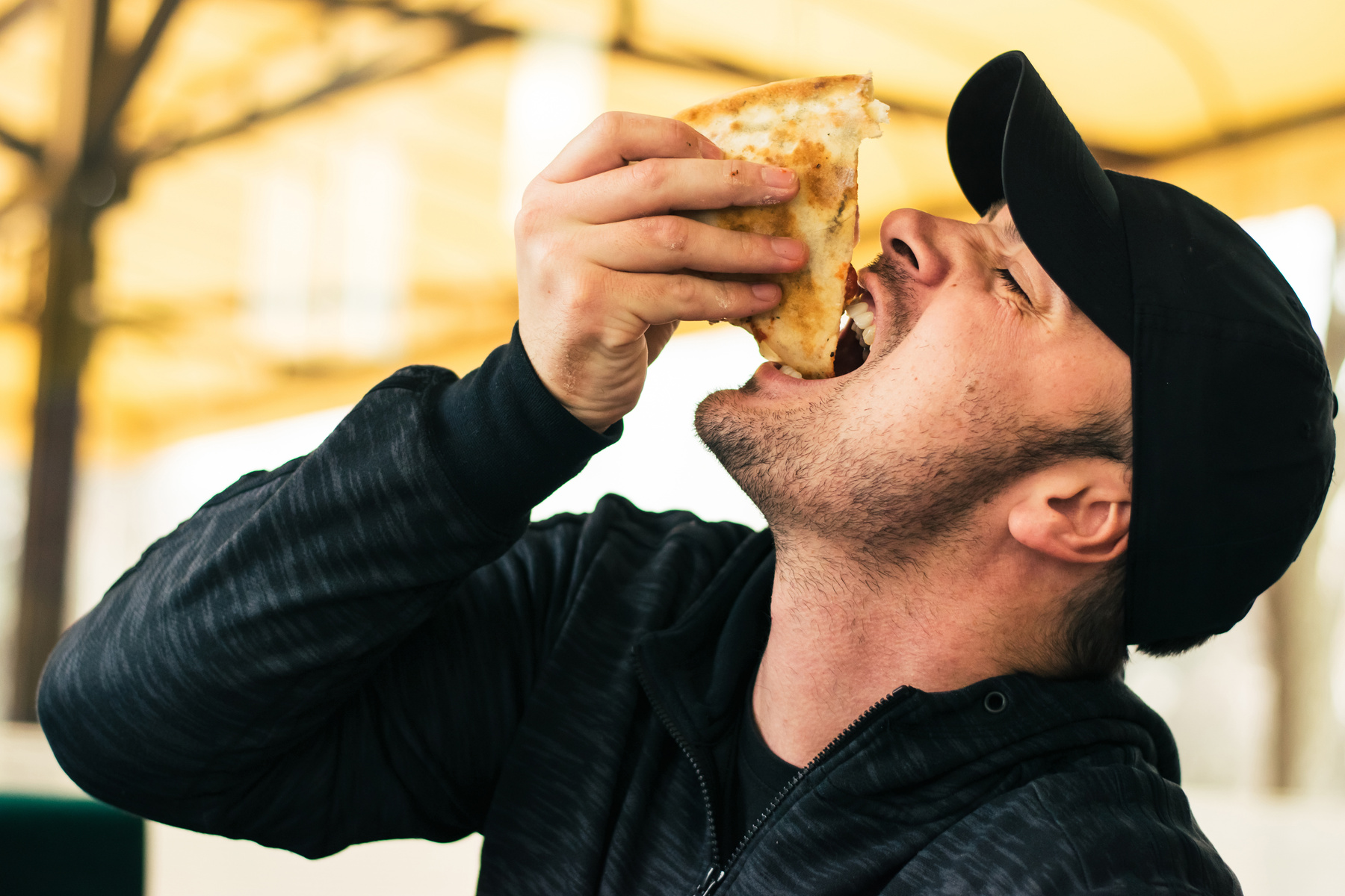 Man eating pizza