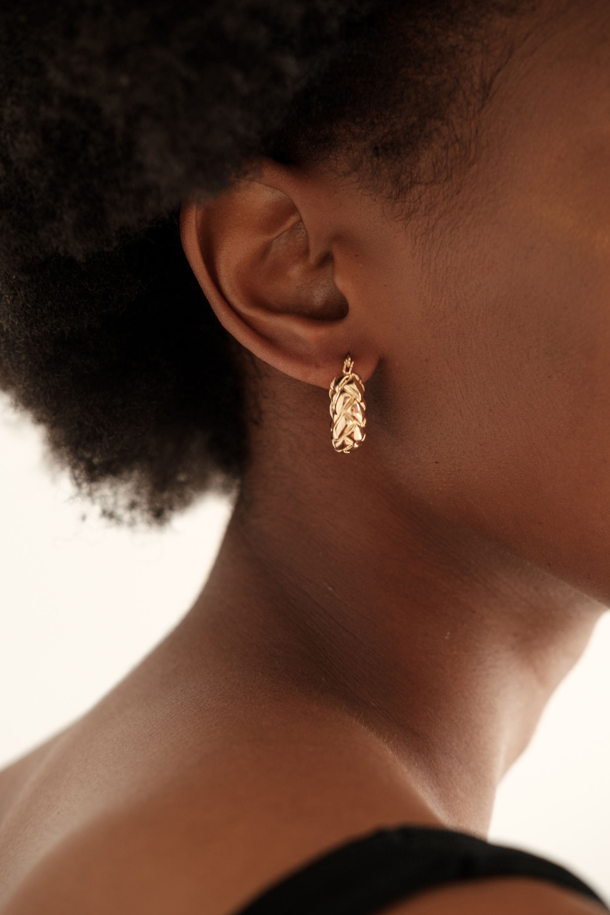 Woman with Minimalist Earrings